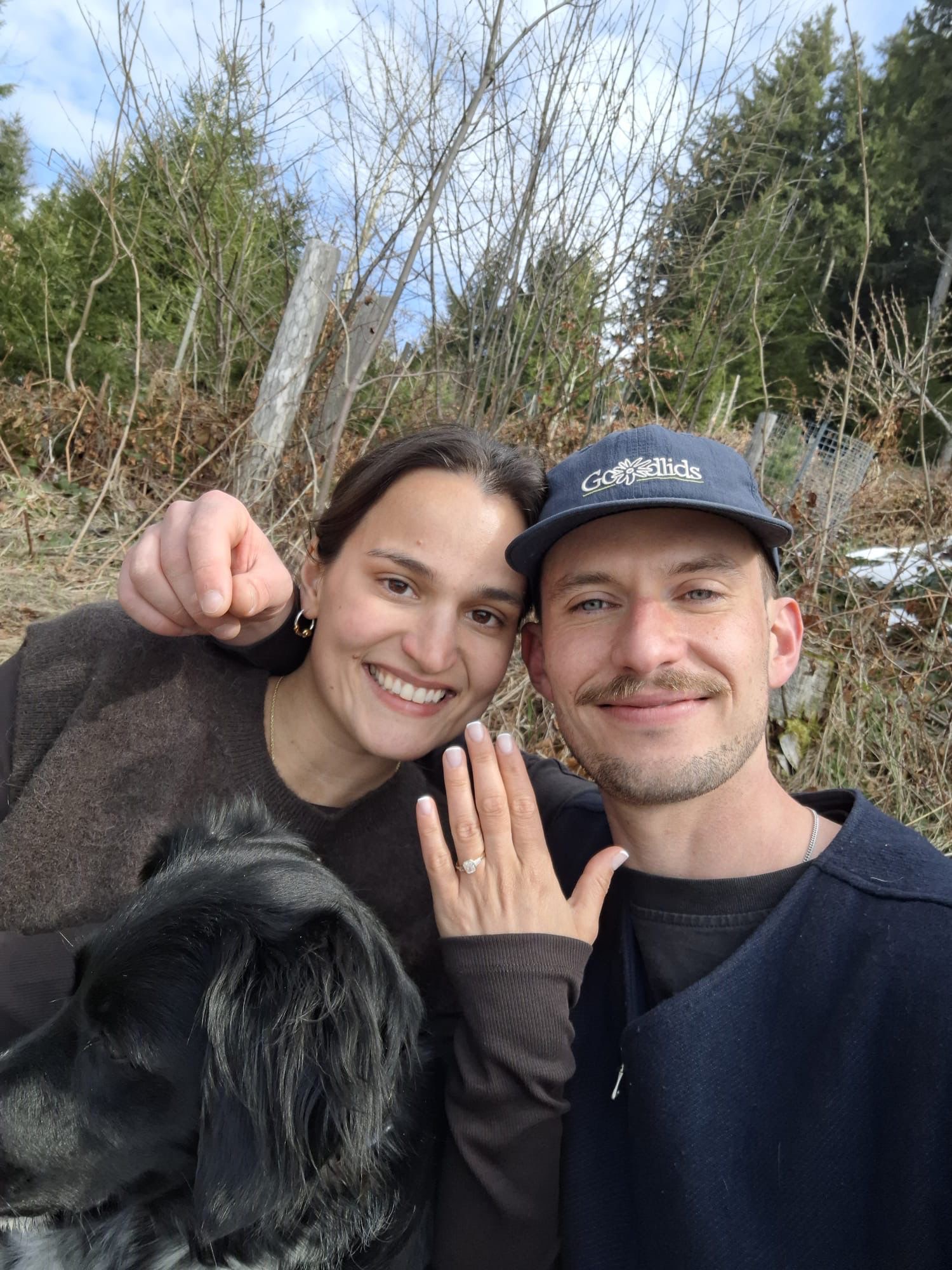 Zoe & Pete engaged, showing the ring