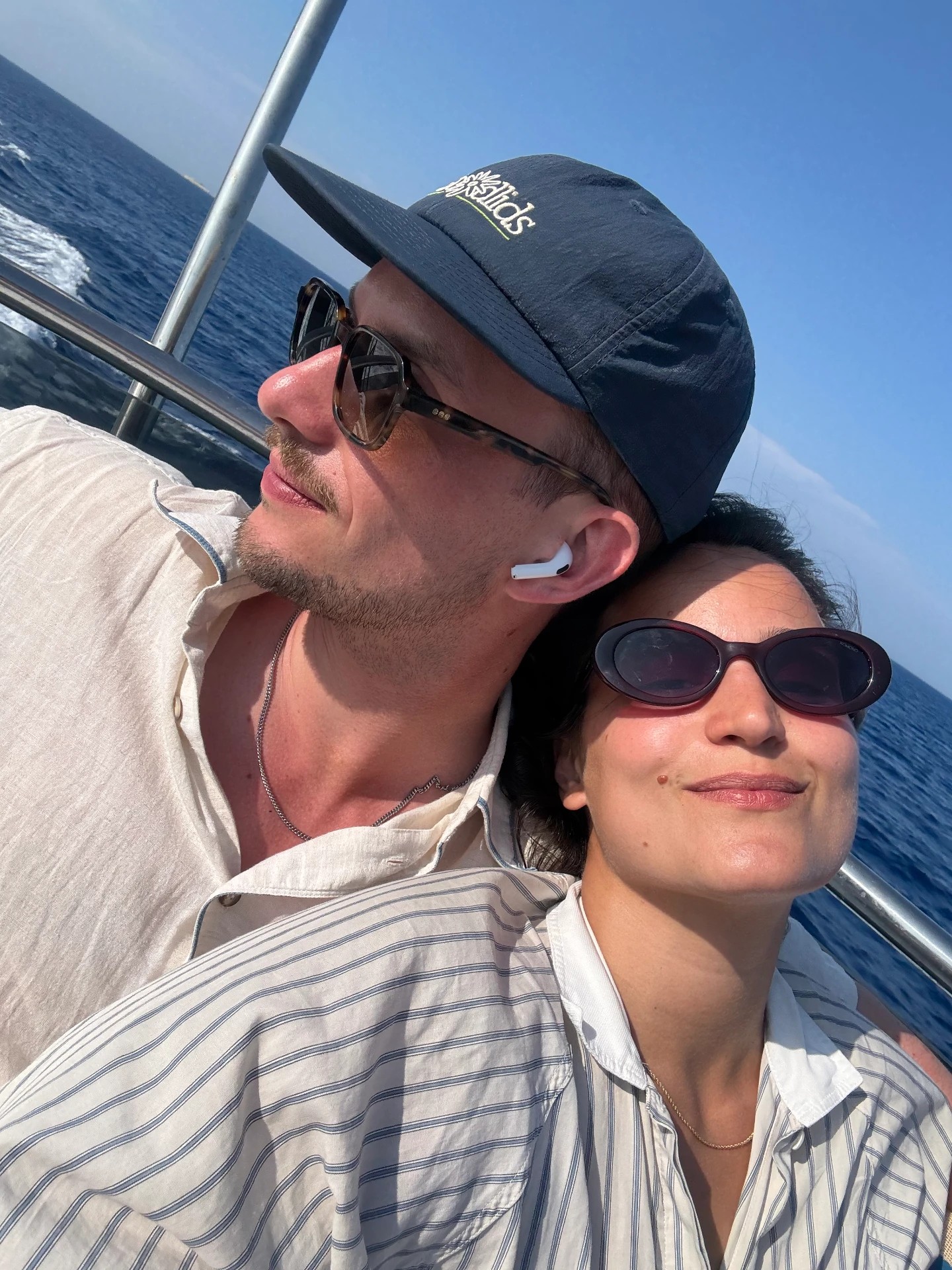 Zoe & Pete relaxing together on a boat